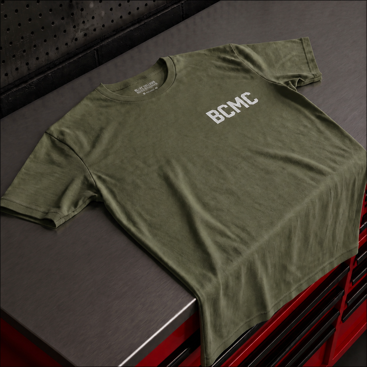 BCMC Tee — close-up front view, military green