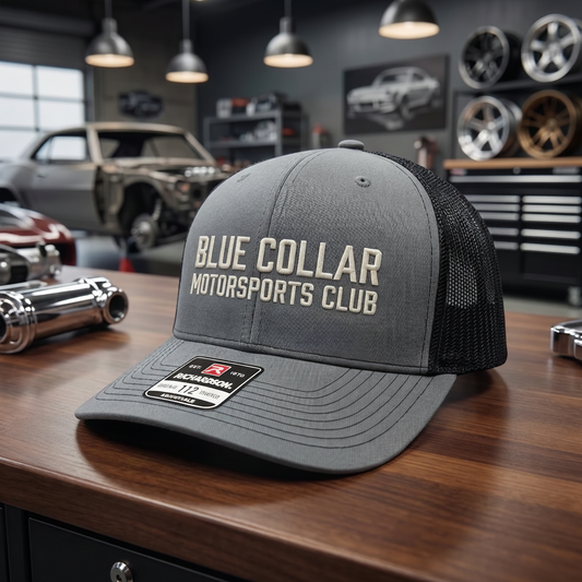 BCMC Trucker Cap — White Logo, front view on adjustable snapback mesh trucker